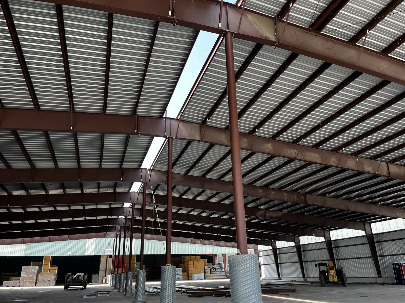 Industrial building steel roof framing seen from inside in North Texas